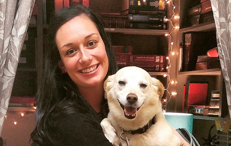 UMKC pharmacy researcher Emma Meyer with her dog