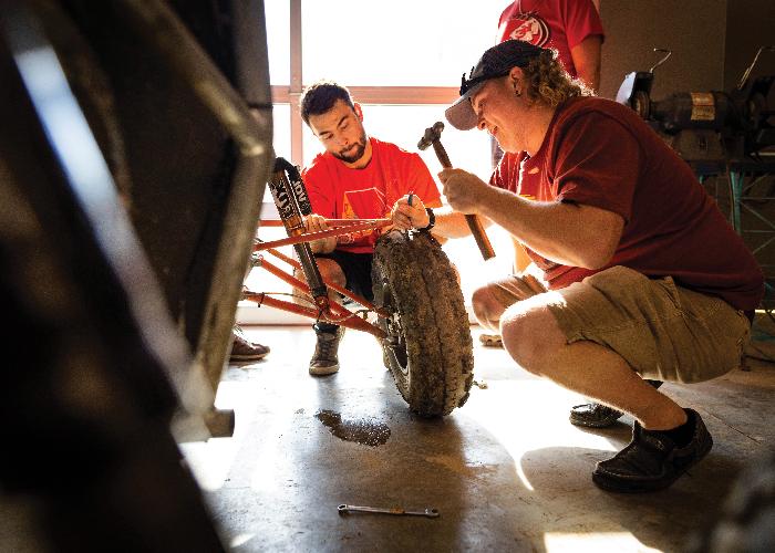 close-up of students working on frame