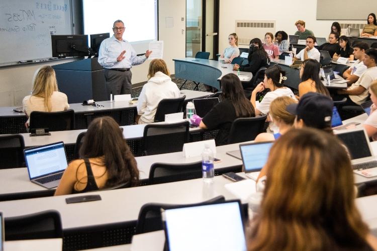 A bloch professor addresses a class