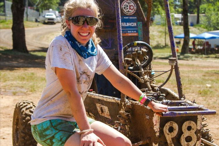 Mya Thomas poses with a baja buggy