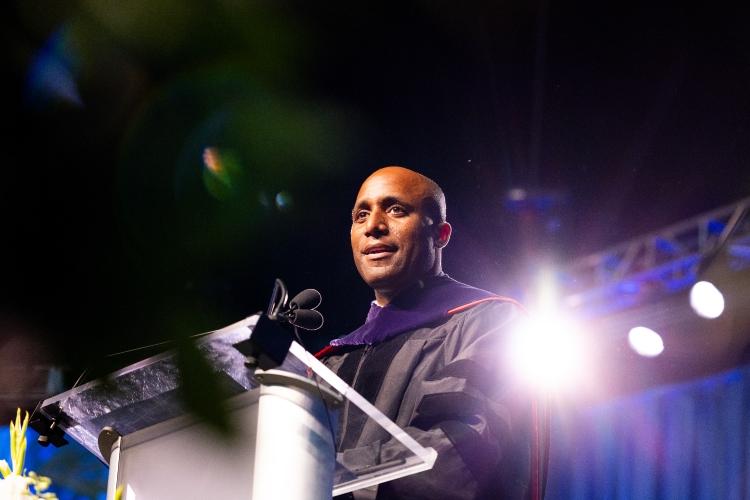 Mayor Quinton Lucas speaks on stage at Commencement